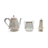 A late Victorian silver plated teapot and sugar bowl, of circular tapering form, with repousse,