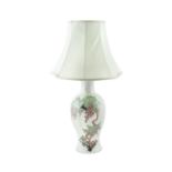 A Chinese porcelain vase, adapted as a table lamp, of circular baluster form, the off-white ground