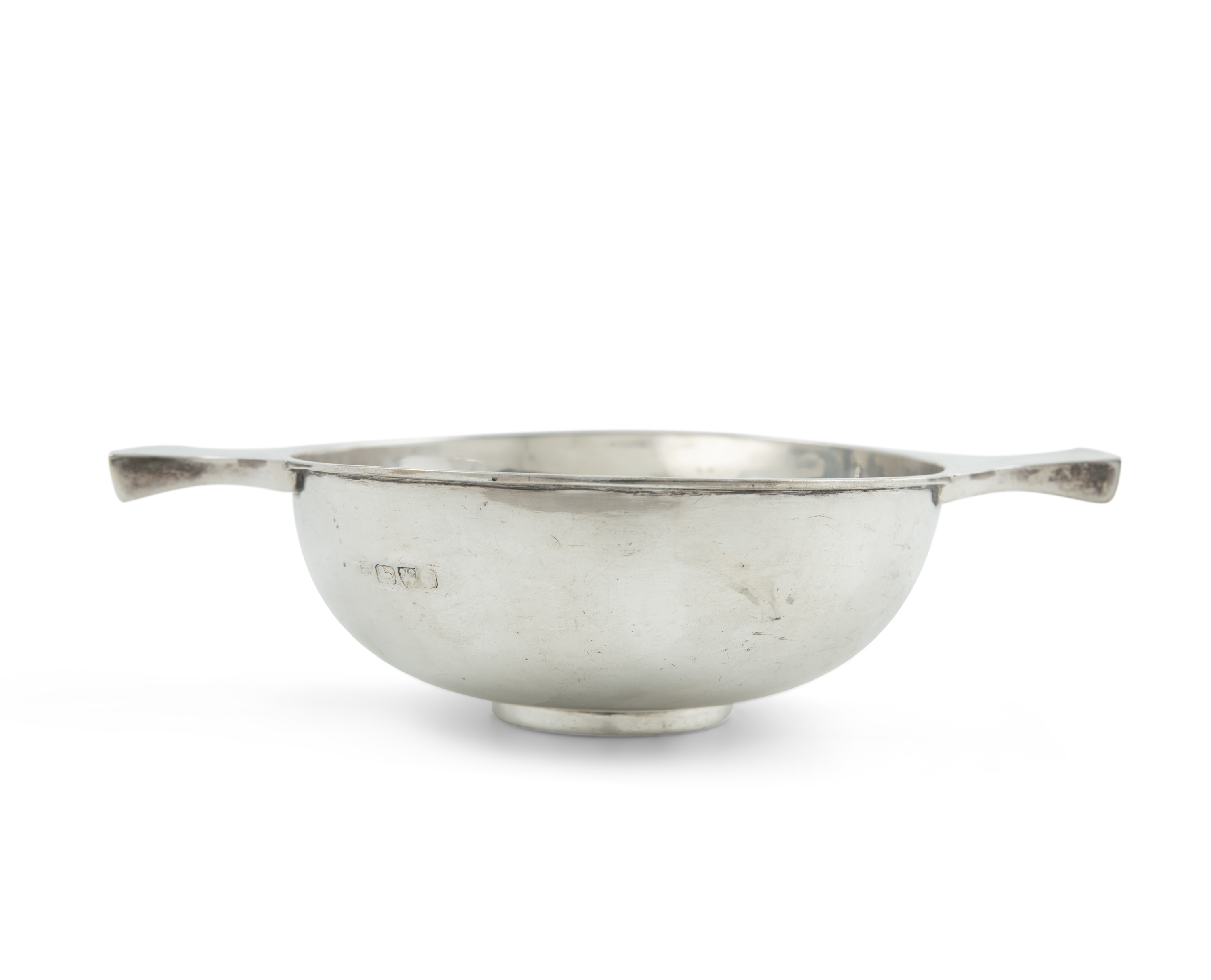A silver two handled bowl, Chester marks rubbed. 21cm long over handles (8¼'') Provenance: With