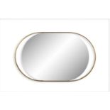 MIRROR An oval brass framed mirror. Italy. 77 x 124.5 x 4 cm