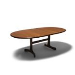 VICTOR WILKINS An oval teak extending dining table by Victor Wilkins, with afromosia banding, with