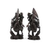 A PAIR OF CHINESE SILVER CHERRYWOOD FIGURES OF WARRIORS AND ATTENDANTS, late 19th century,