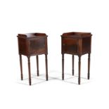 A PAIR OF MAHOGANY TRAYTOP BEDSIDE TABLES, each with shallow three quarter gallery and figured panel