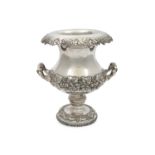 A LARGE REGENCY SILVER PLATED WINE COOLER, of campagna form, with everted rim and foliate cast