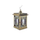 AN EDWARDIAN BRASS AND STAINED GLASS HALL LANTERN, the flat panel sides with stained and coloured