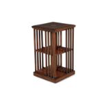 A MAHOGANY REVOLVING BOOKCASE, of square form, with slender rail supports. 92 x 48cm