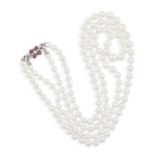 A CULTURED PEARL NECKLACE WITH GEMSET CLASP, composed of two rows of cultured pearls of white