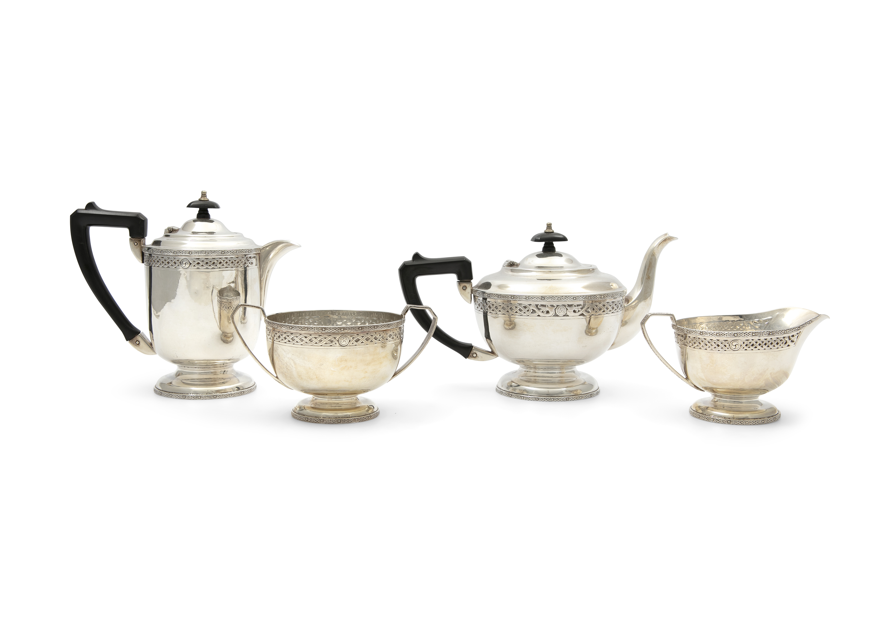 AN IRISH SILVER FOUR PIECE CELTIC REVIVAL TEA & COFFEE SERVICE, Dublin 1960, mark of William Egan of