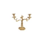 A ROCOCO STYLE ORMOLU TWIN BRANCH CANDELABRUM, 19th century, cast with leaves, flowerheads, shell