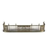 A 19TH CENTURY BRASS RAIL FENDER, with rope twist edge and painted finials over spindle frieze