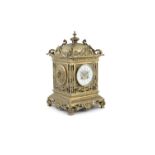A FRENCH CAST BRASS MANTLE CLOCK, early 20th century, of squared shape, the dome top with fluted