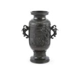 A JAPANESE BRONZE TWO HANDLED VASE, Meiji Period (1868 - 1912), of cylindrical form, decorated