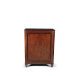 A GEORGE IV MAHOGANY AND ROSEWOOD BANDED CUPBOARD, c.1820, of rectangular form, with reeded edge and
