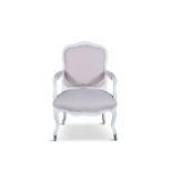 A LOUIS QUINZE STYLE PAINTED TIMBER FRAMED UPHOLSTERED FAUTEUIL ARMCHAIR, covered in pink fabric,