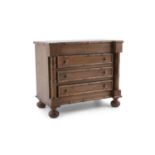 A SMALL ELMWOOD TABLE CHEST OF THREE LONG DRAWERS, with simulated bamboo facings, and turned feet.