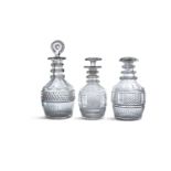 A COLLECTION OF THREE IRISH MALLET-SHAPED CUT GLASS DECANTERS, early 19th century, with stoppers,