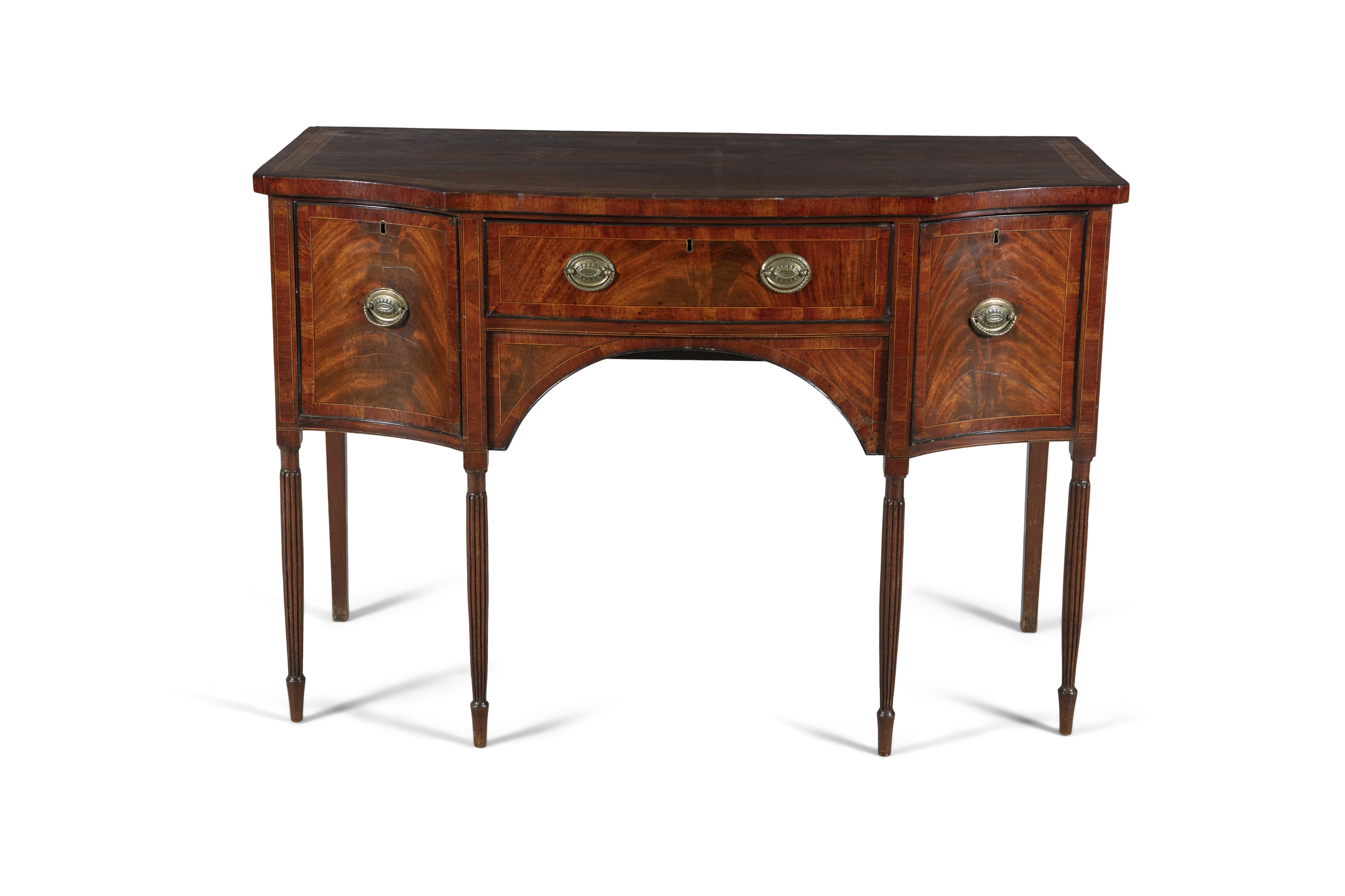 A GEORGE III MAHOGANY CROSS BANDED SERPENTINE SIDEBOARD, of compact form, the shaped rectangular top