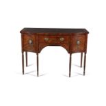 A GEORGE III MAHOGANY CROSS BANDED SERPENTINE SIDEBOARD, of compact form, the shaped rectangular top