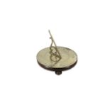 A 19TH CENTURY BRASS SUNDIAL, by Lynch & Son of Dublin, on a later mahogany circular base. 26cm