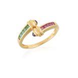 A GEM-SET RING, composed of circular-cut rubies and emeralds with reeded gold terminals