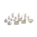 A COLLECTION OF BELEEK THIRD PERIOD MINIATURE VESSELS, of various shapes, each with plain white