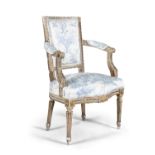 A FRENCH 19TH CENTURY GILTWOOD OPEN ARMCHAIR, with ribbon and reel carved frame, upholstered in blue