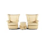 A PAIR OF UPHOLSTERED EDWARDIAN STYLE ARMCHAIRS, with wide buttoned back, the entire covered in a