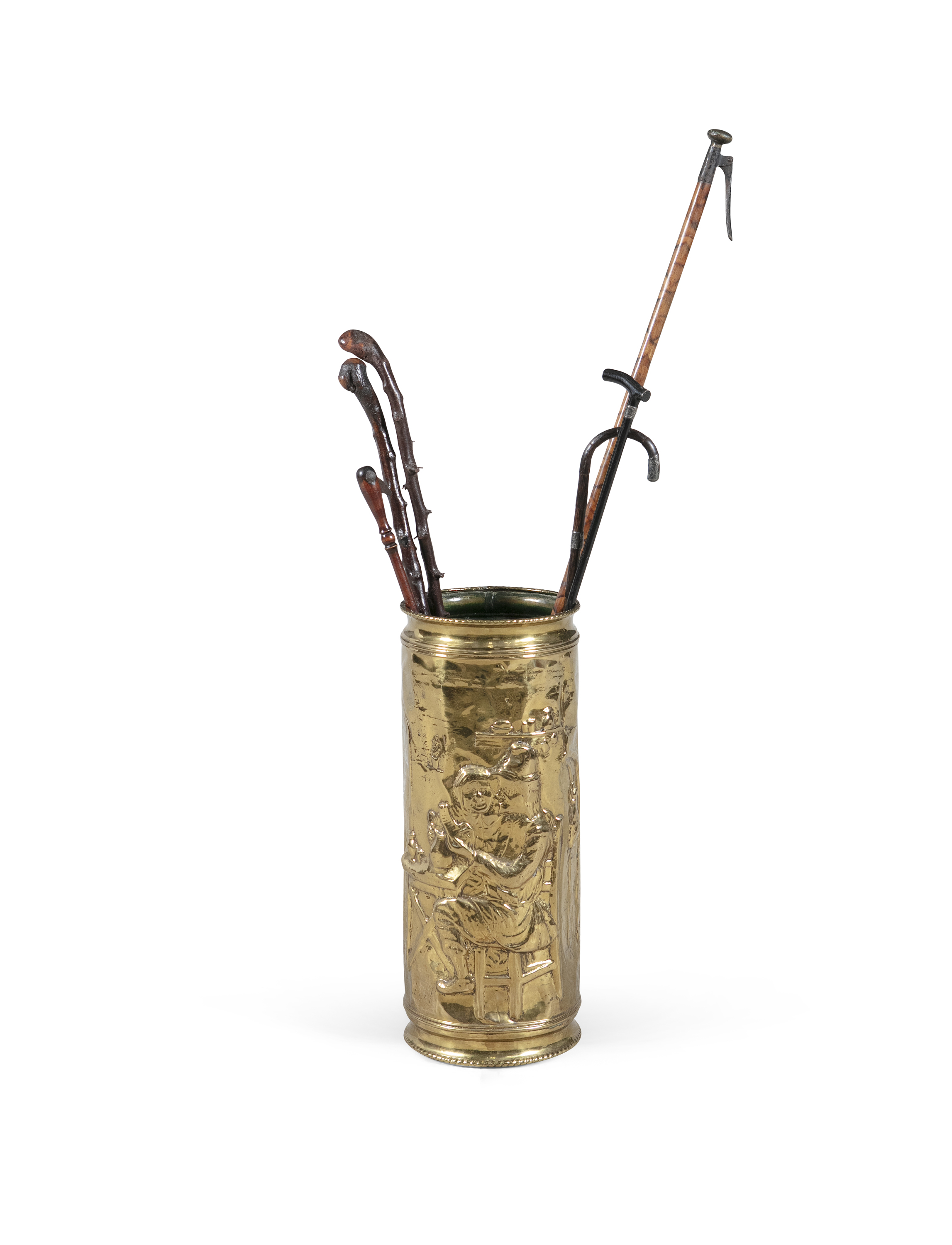 A BRASS CYLINDRICAL STICK STAND, with embossed figural decoration, in the manner of David Teniers. - Image 2 of 3