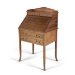 AN EDWARDIAN INLAID MAHOGANY BUREAU DU DAME, fitted slopefront writing section and drawers. 65cm