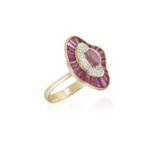 A RUBY AND DIAMOND DRESS RING, the marquise-shaped ruby at the centre between a frame of brilliant-