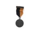 A 1917-1921 'COGADH NA SAOIRSE' WAR OF INDEPENDENCE BRONZE SERVICE MEDAL, on black and tan ribbon