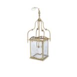 A LATE 19TH CENTURY BRASS FRAMED HALL LANTERN, of rectangular form, suspended from a centre column