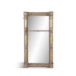 A WILLIAM IV GILTWOOD COMPARTMENTED PIER MIRROR, of upright rectangular form, fitted with two