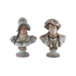 A PAIR OF CONTINENTAL POTTERY BUSTS OF A GENTLEMAN AND LADY, signed 'E. Eichler', each dressed in