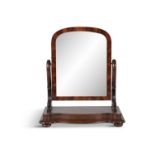 A VICTORIAN MAHOGANY CRUTCH FRAMED TOLIET MIRROR, with adjustable plate on scrolled uprights