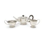 AN IRISH SILVER THREE PIECE TEA SERVICE, assayed in Dublin 1935, struck with mark 'EGAN CORK', of