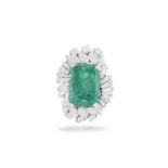 AN EMERALD AND DIAMOND BALLERINA RING The rectangular cut-cornered emerald weighing approximately