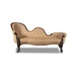 A VICTORIAN MAHOGANY FRAMED UPHOLSTERED SERPENTINE BACK COUCH, with buttoned back and padded seat,