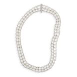 A CULTURED PEARL NECKLACE WITH DIAMOND CLASP, composed of cultured seed pearls throughout