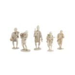 A COLLECTION OF FIVE JAPANESE IVORY FIGURES, Meiji Period c.1900, modelled as a tradesmen and street