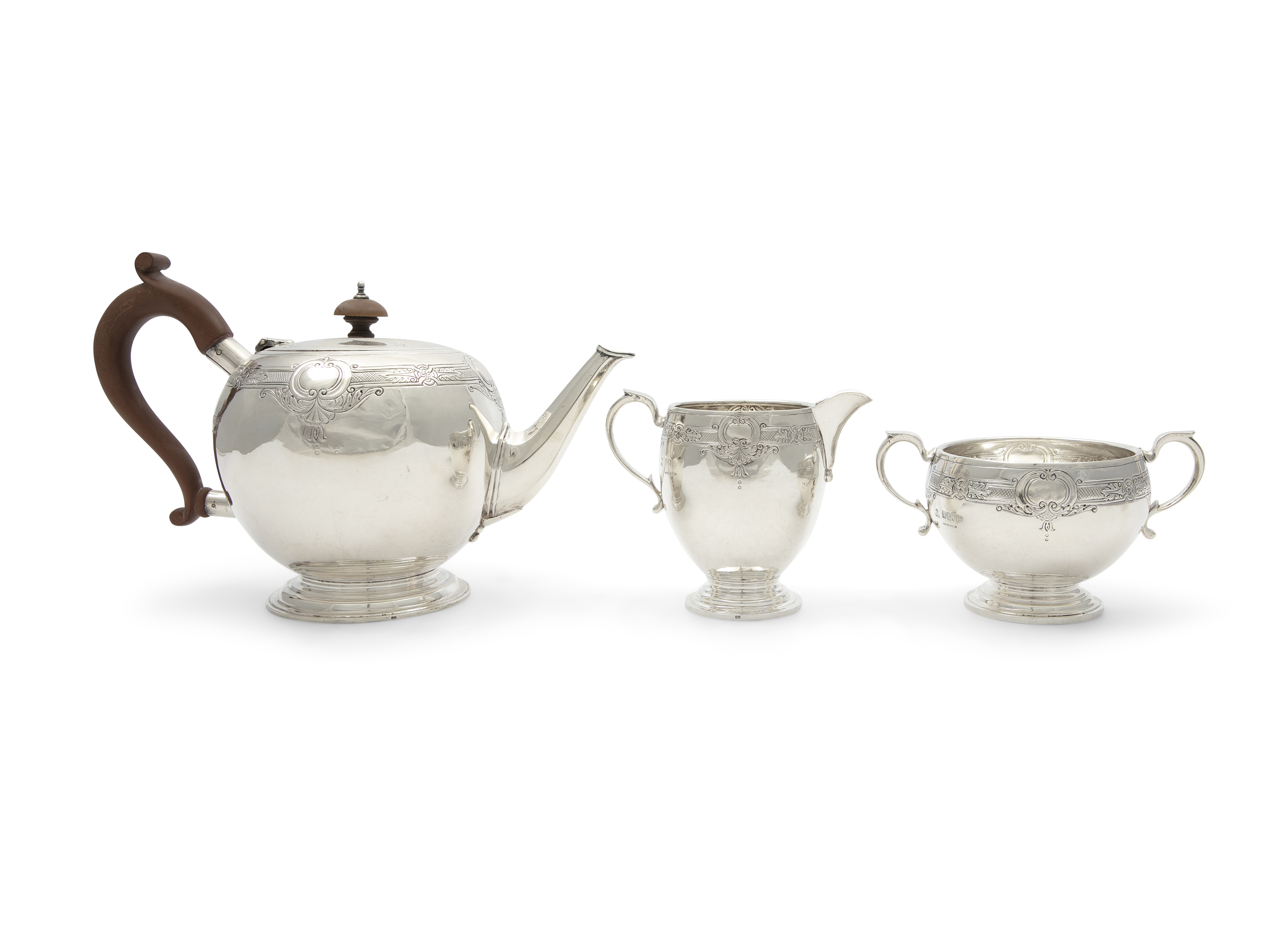 AN IRISH SILVER THREE PIECE TEA SERVICE, Dublin 1934, mark of West & Son, comprising a bullet shaped