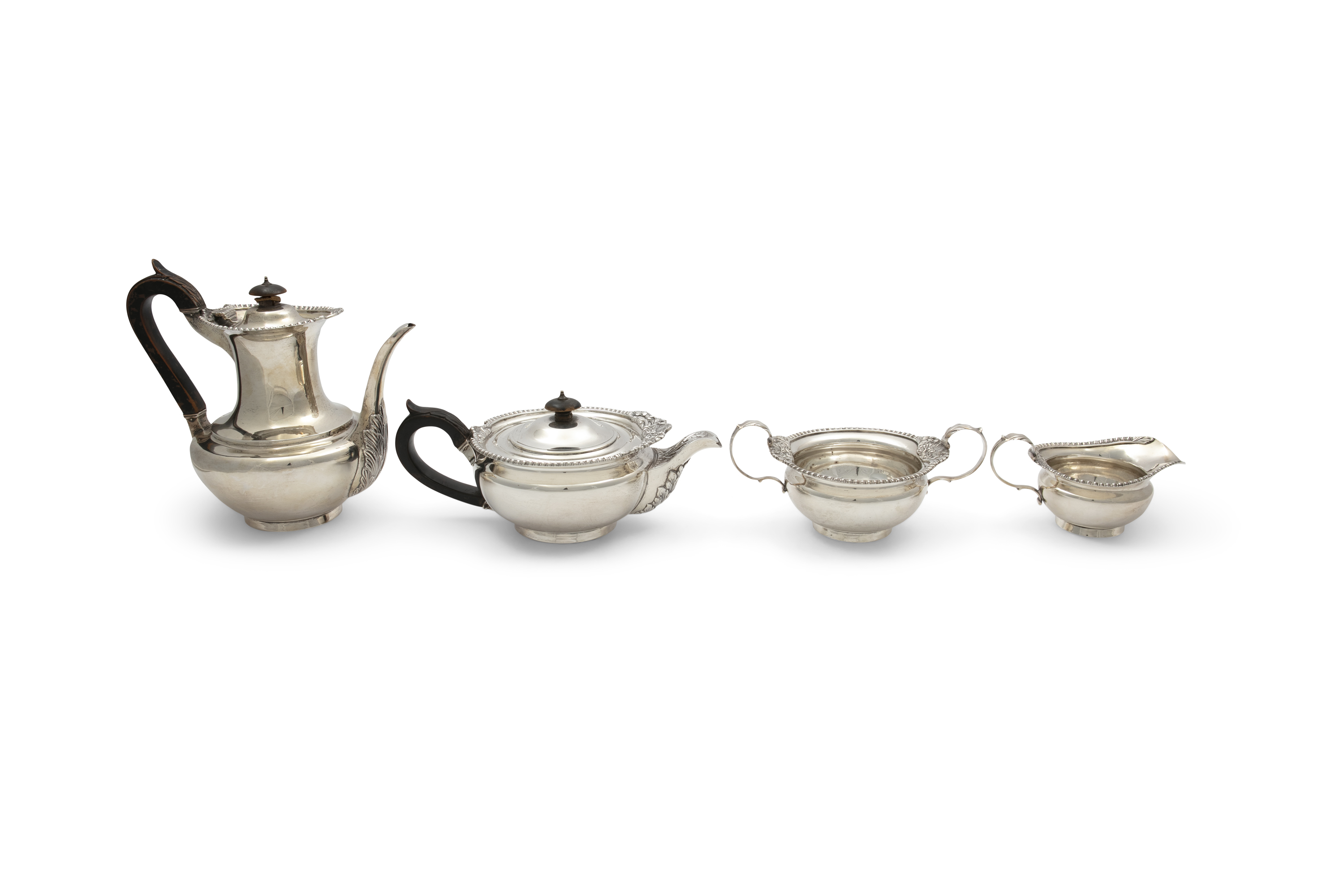 AN EDWARDIAN FOURPIECE SILVER TEA AND COFFEE SERVICE, London 1903/1904, of classical design,