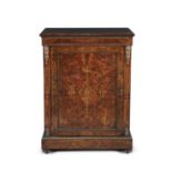 A VICTORIAN INLAID WALNUT SIDE CABINET, with single door decorated with ormolu mounts, raised on bun