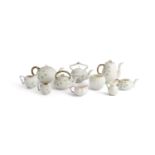 A COLLECTION OF BELLEEK THIRD PERIOD SHAMROCK PATTERN TEA WARE, comprising teapots, coffee pot,