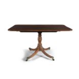 A 19TH CENTURY MAHOGANY RECTANGULAR TILT TOP SUPPER TABLE, with reeded rim and raised on turned