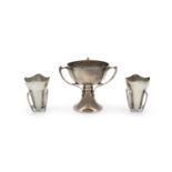 A PAIR OF IRISH SILVER 'METHER' TRIFORM CUPS, Dublin 1934, mark of West & Son, each 7cm high;