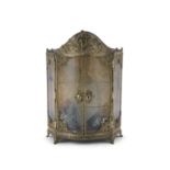 A PRESSED BRASS FRAMED MINIATURE VITRINE, with twin glazed doors and glazed side panels enclosing