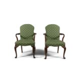 A PAIR OF GEORGIAN REVIVAL UPHOLSTERED OPEN ARMCHAIRS, c.1920s, each with padded back and seat,