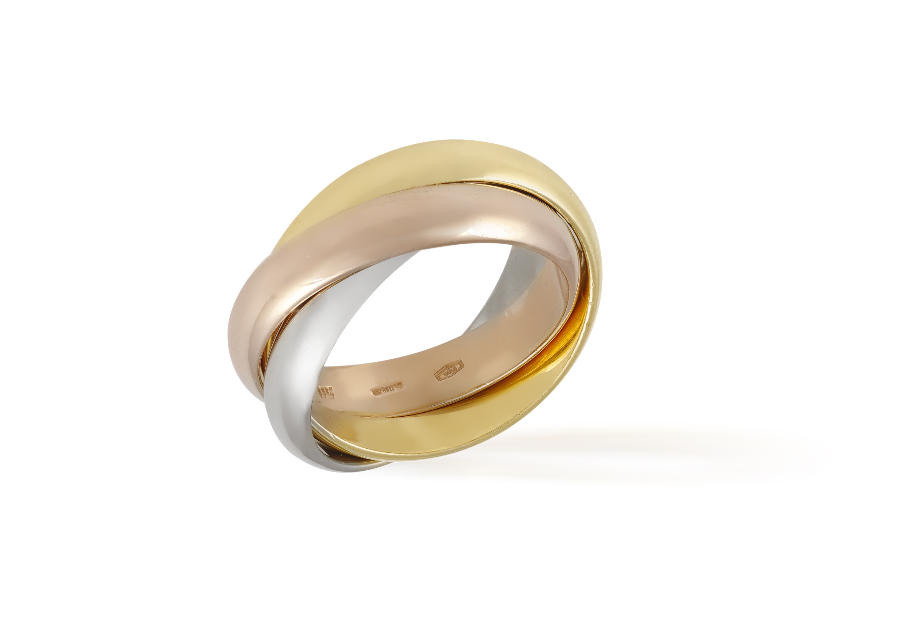 A TRI-COLOURED 'TRINITY' GOLD RING, BY CARTIER A three interlocking hoops of rose, yellow and