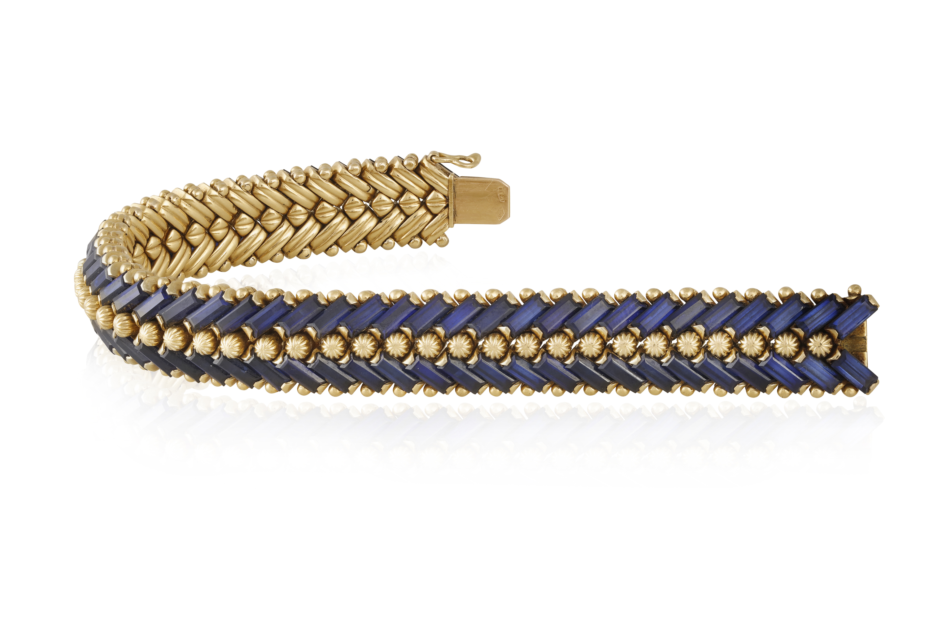 A SAPPHIRE BRACELET, BY ILLARIO, CIRCA 1955 The supple and articulated bracelet composed of two rows